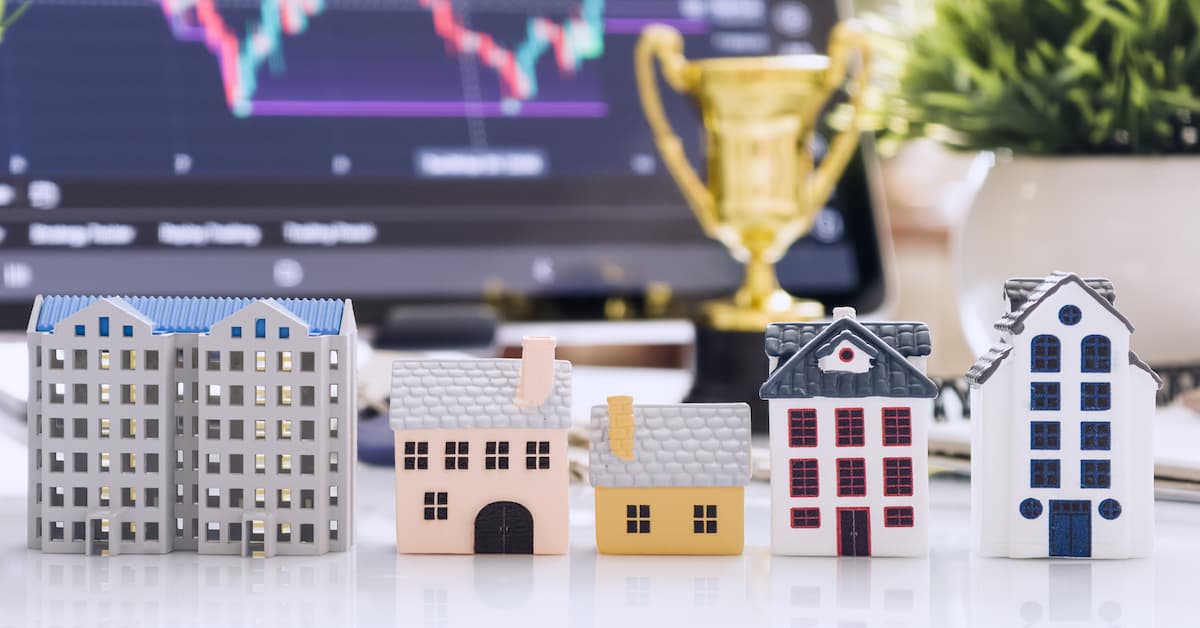 Client Year Wrapped_ From Financial Blind Spots to Strategic Expansion (Blog) Miniature houses with financial charts background
