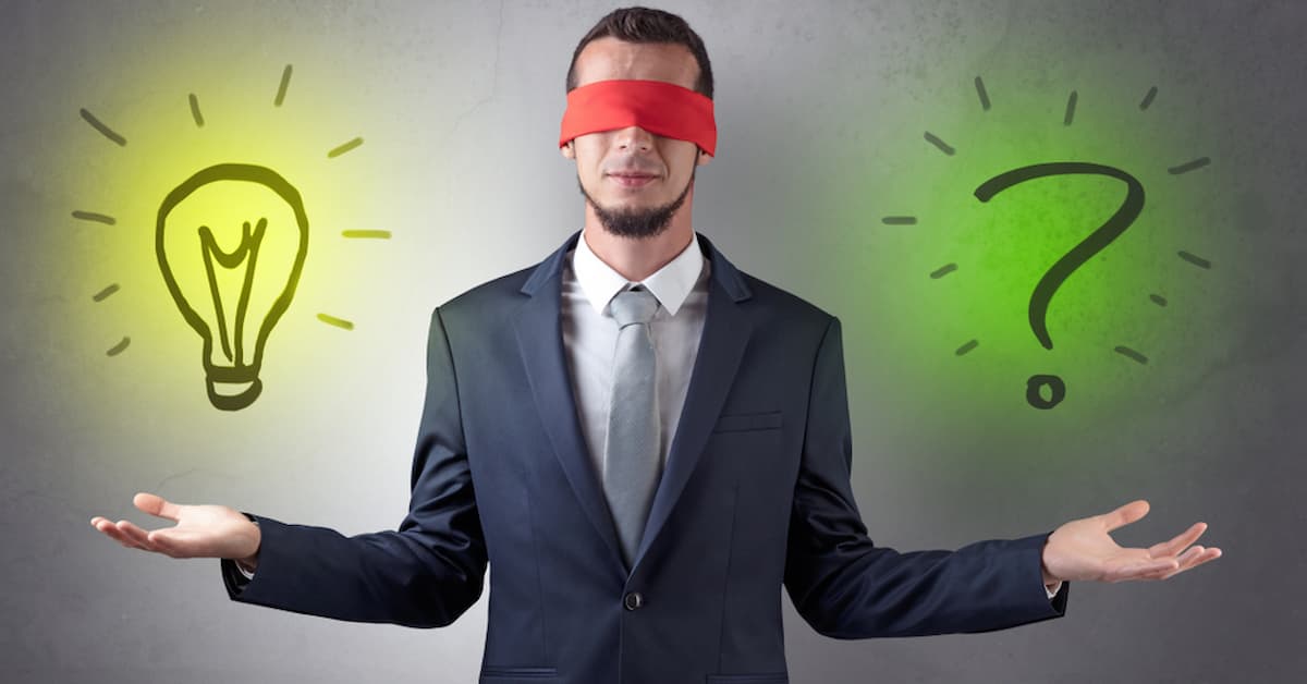 Blindfolded man with ideas and questions