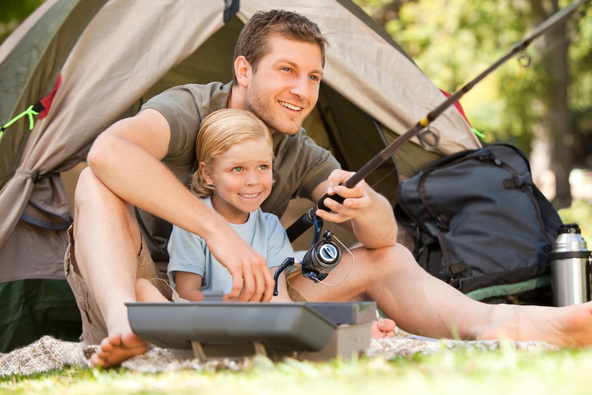 Father and son enjoying fishing together.