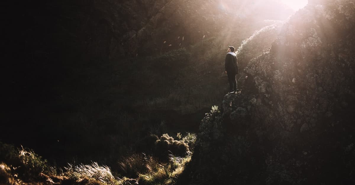 Person standing on rocky landscape