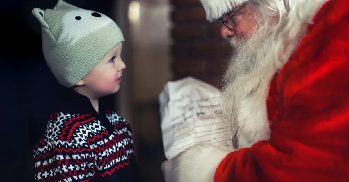 Child meeting Santa Claus, festive atmosphere